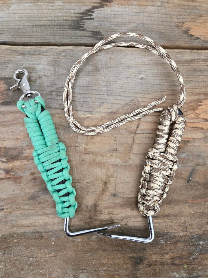 Day to day, use this as a normal hoofpick. In an emergency, untie the paracord and use it as a makeshift halter, lead, rein, or snap. Comes with instructions for retying the paracord to the hoof pick when the emergency is over, ready to be used again, attached to your belt, saddle, or in your first-aid kit. 